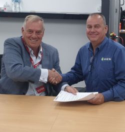 State Gas Executive Chairman Mr Richard Cottee (left) and MES CEO Adrian Abbott sign the MOU