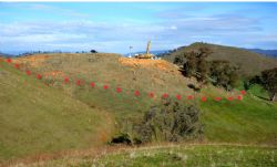 Figure 3 – The surface extent of the Hobbs Pipe in outcrop shown by red dots. View to south.
