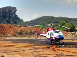 Figure 3. Helicopter at Triton Exploration Base preparing to undertake airborne geophysical surveys at Balama North