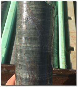 Drill core from HBRC001 approx 490m, showing intense chlorite alteration (khaki colour) with zinc sulphide (brown) and lead sulphide (silver) mineralisation.
