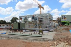Photograph 1. Cyanide unloading pad, and CIL gold room construction