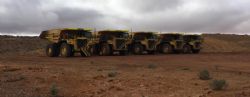 Photo 1: MACA mining fleet ready for action