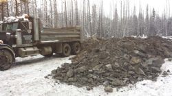 Rock phosphate stockpiled ready to transport from Wapiti to Beaverlodge using large 42 tonne trucks