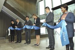 Ribbon-cutting ceremony attended by local government officials and Adient management team