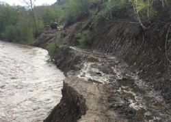 Access road in main Chatkal valley washed away by the Chatkal River.