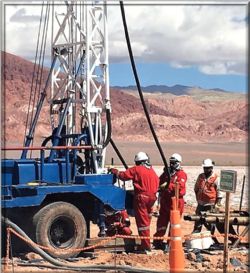 the rotary drill rig adjacent to the second drill hole of the Kachi project