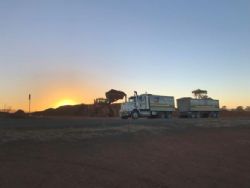 Truck loading at dawn