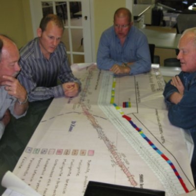 Alan Hawke conferring with Sarissa's independent geological consultants on the 43-101 report.